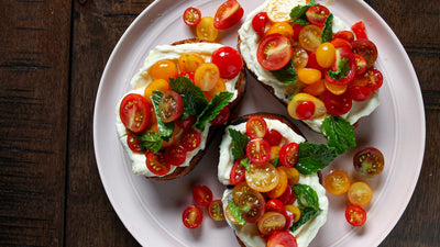 Lemony Whipped Ricotta Toasts with Cherry Tomatoes & Mint
