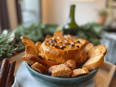 Baked Vacherin Chaudron d\u2019Or with crostini