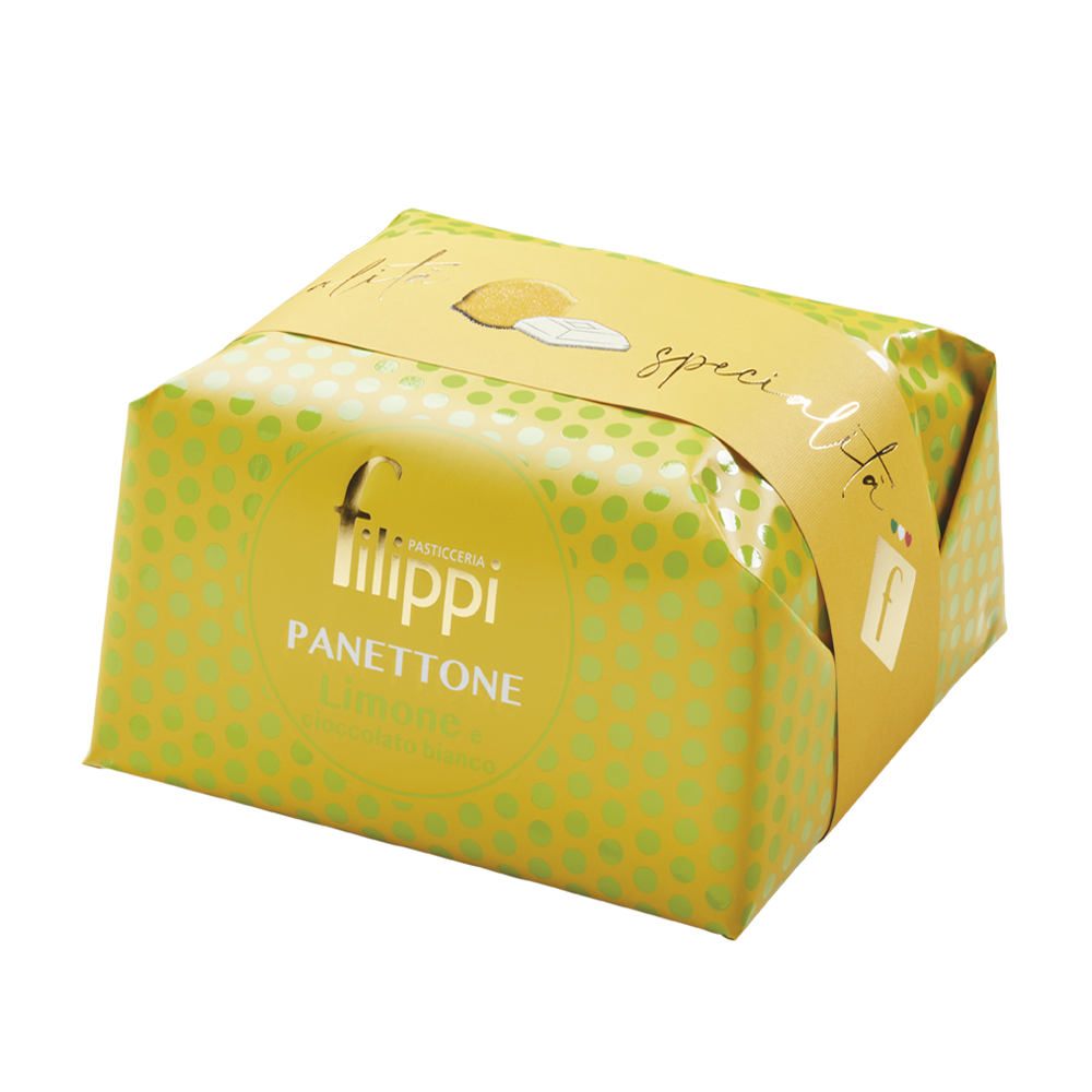 Lemon and white chocolate panettone in bright yellow packaging on a white background