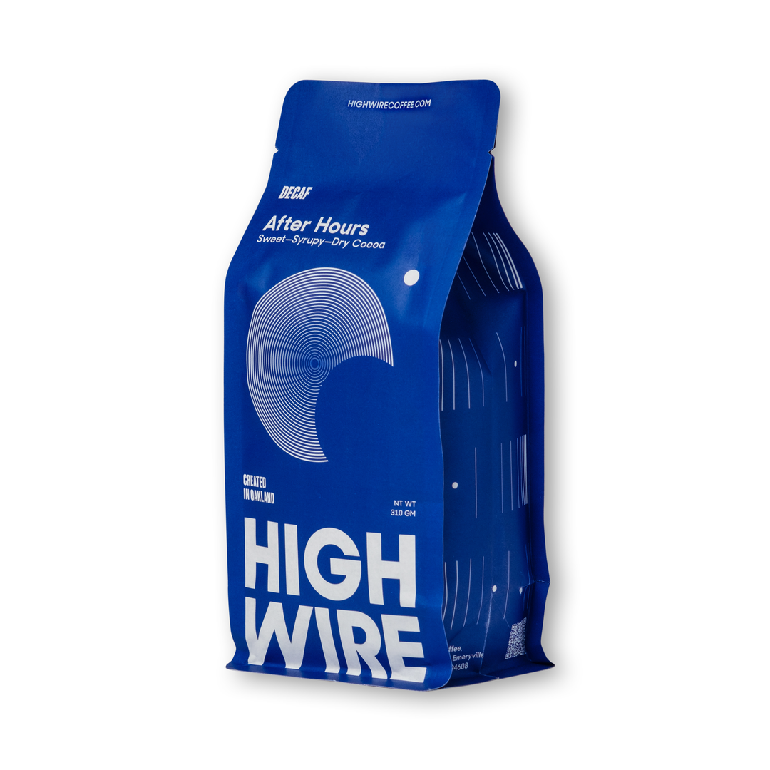 A blue bag of Highwire Coffee Roasters decaf coffee beans labeled 'After Hours'.