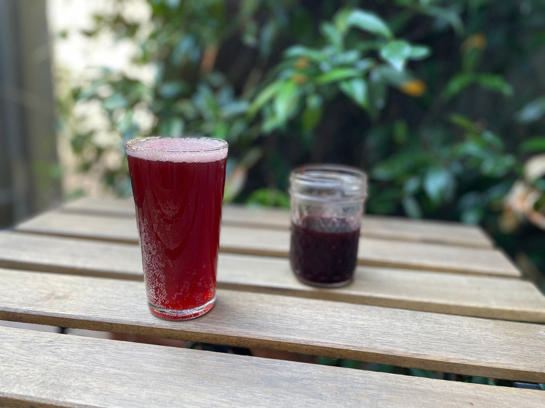 Plum syrup with sparkling water