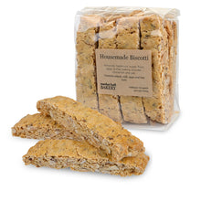 Clear bag of Housemade Biscotti with three biscotti cookies outside of the package