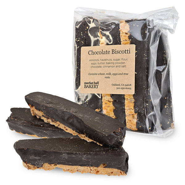 Clear package of Market Hall Bakery Chocolate Biscotti with three biscotti outside the bag