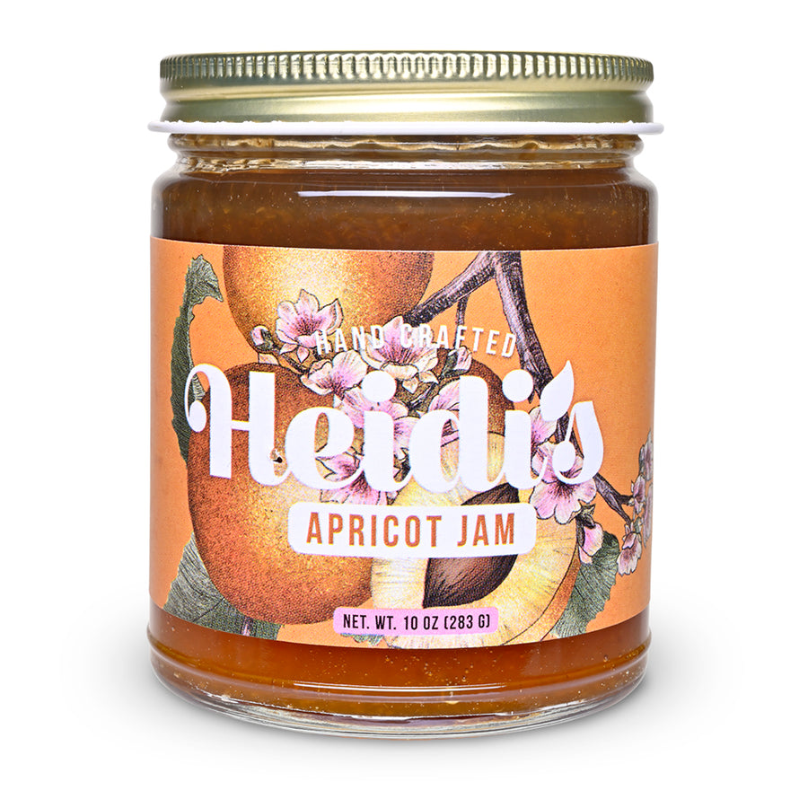 Jar of Heidis Apricot Jam with a decorative label on a white background