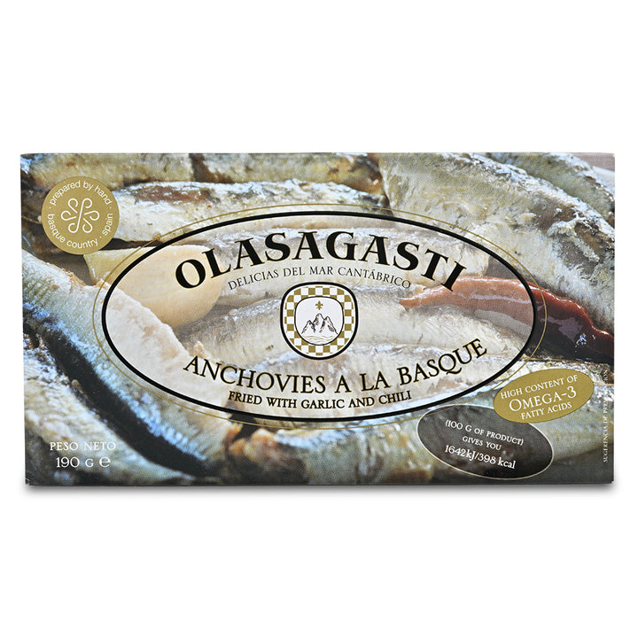 Olasagasti anchovies a la basque packaging with anchovies and garlic on a white background