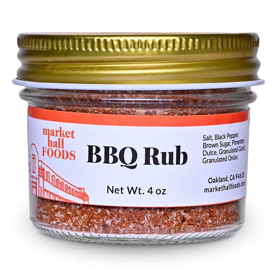 Jar of BBQ Rub with a gold cap on a white background