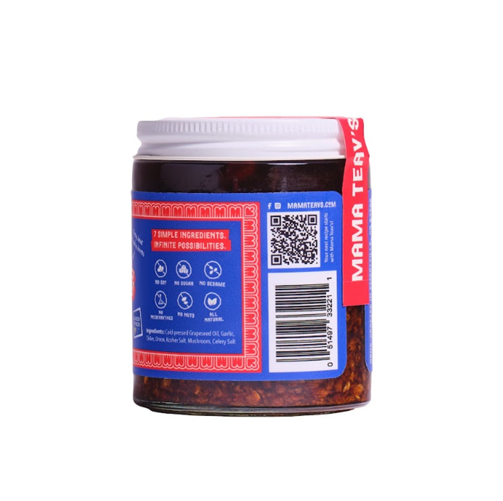 A jar of Mama Teavs showing the back label with a barcode, QR code, and product details, on a solid white background.