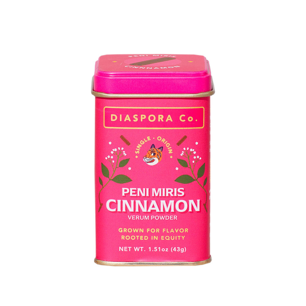 Pink tin of Diaspora Co. Peni Miris Cinnamon powder