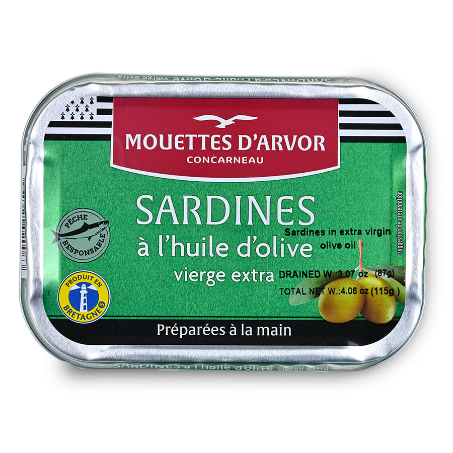 A tin of Mouettes D'Arvor Concarneau Sardines in extra virgin olive oil, featuring a green label with a red brand banner and a silver metal container.