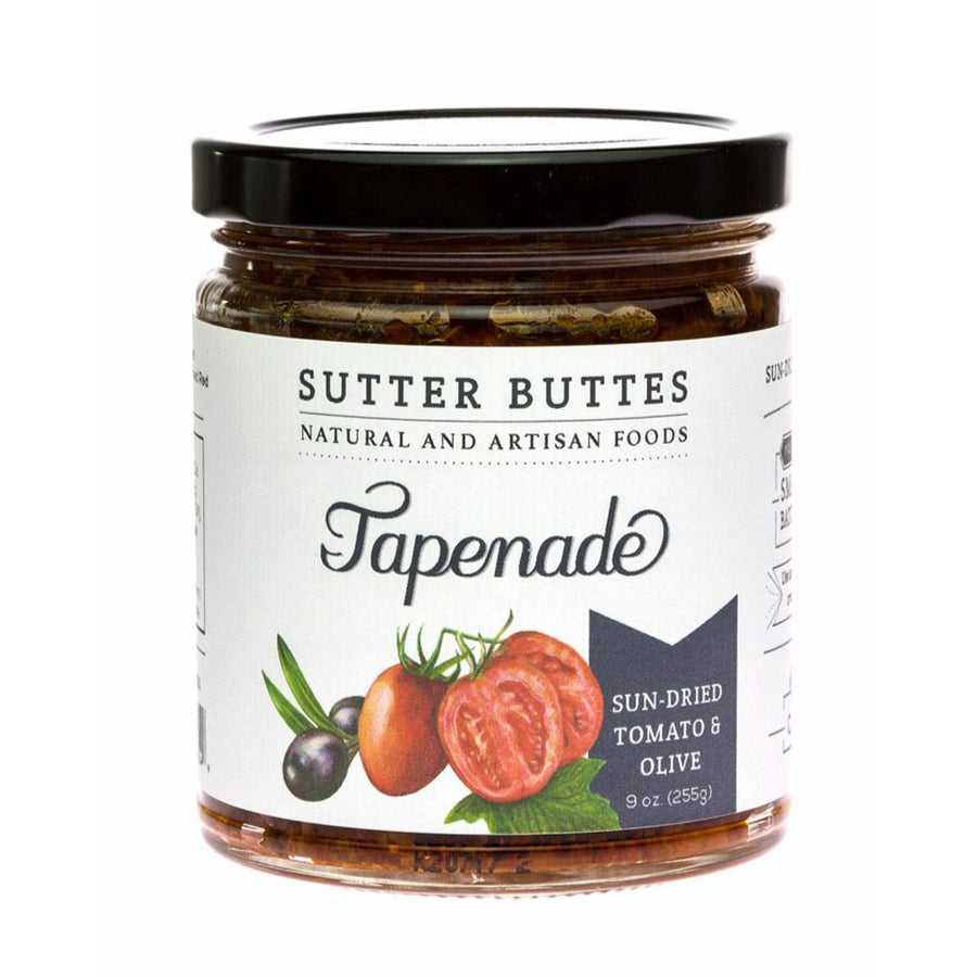 Jar of Sutter Buttes Tapenade with sun-dried tomato and olive label on a white background