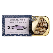 Open tin of FANGST Nordic sardine smoked with heather and chamomile