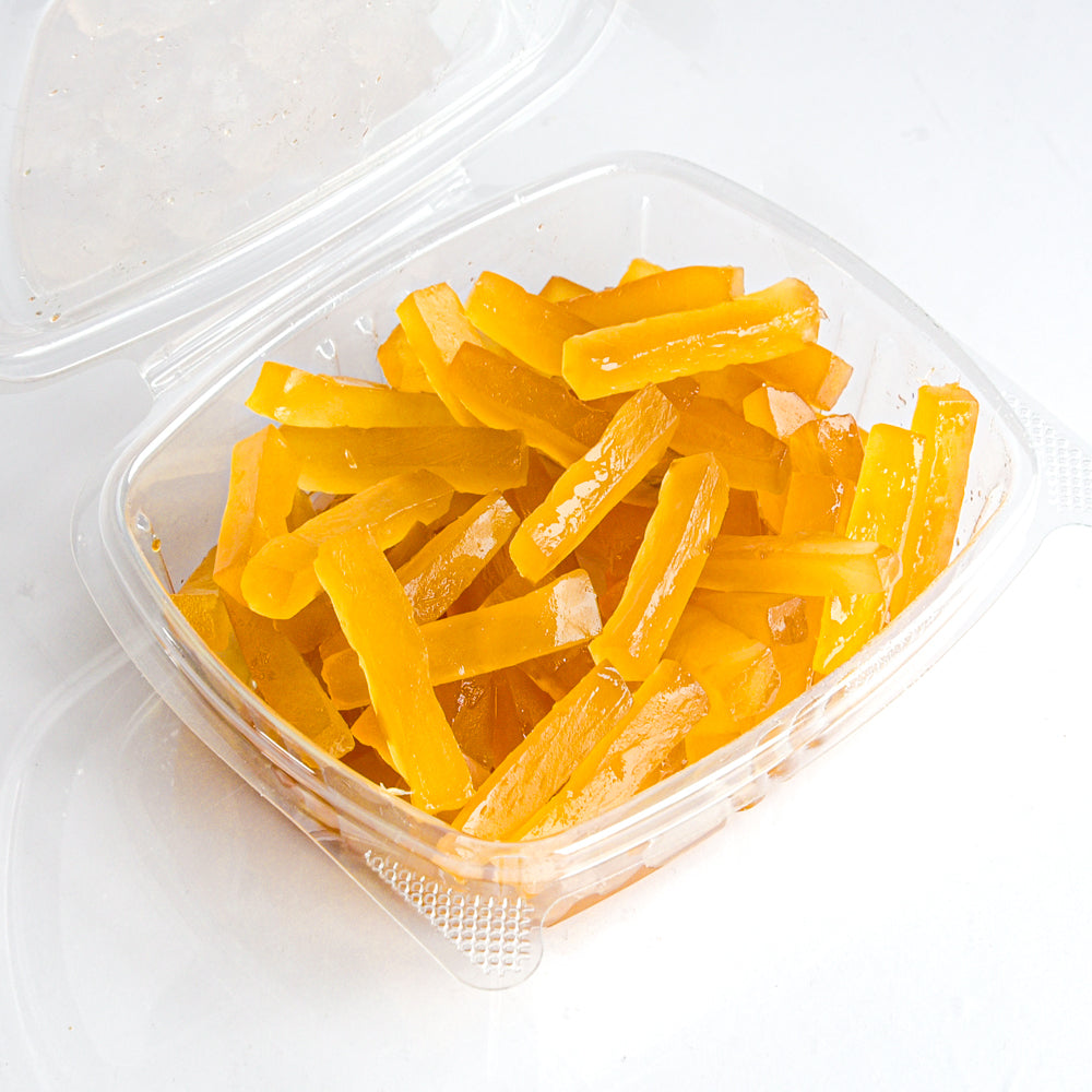 Candied ginger strips in a container