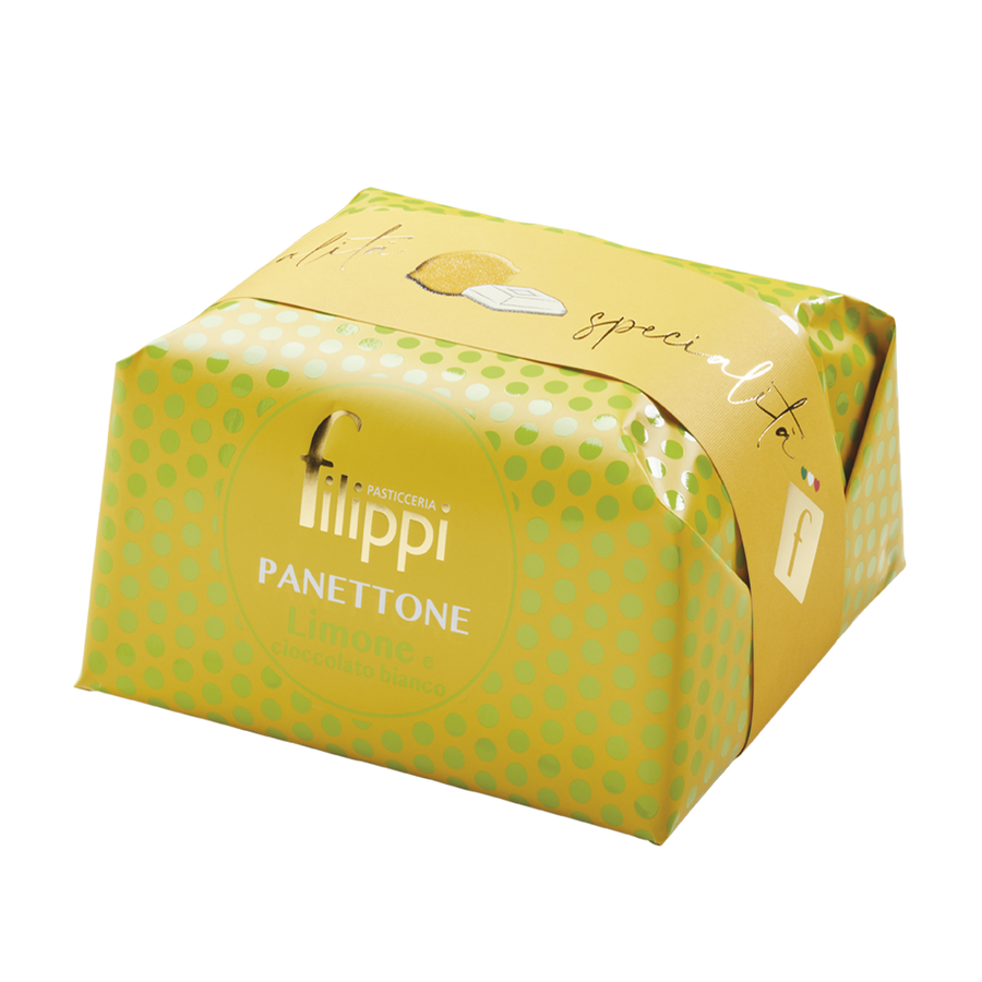 Lemon and white chocolate panettone in bright yellow packaging on a white background