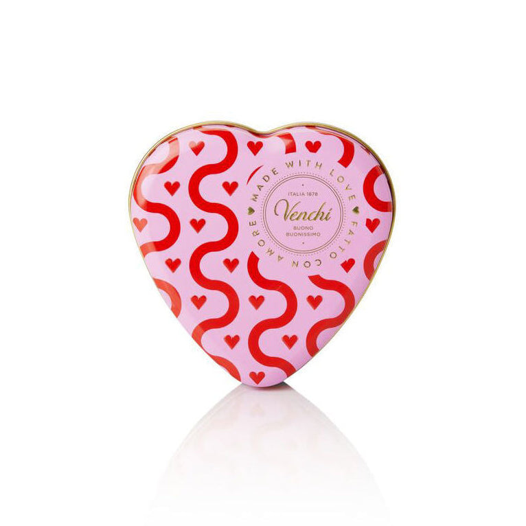 Pink and red heart-shaped tin
