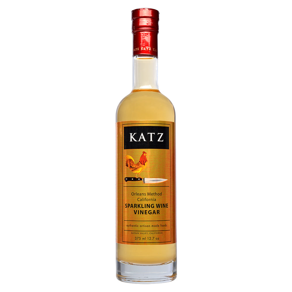 Bottle of Katz sparkling wine vinegar on a white background