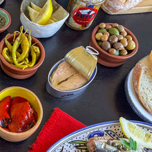 Open tin of Ortiz ventresca tuna