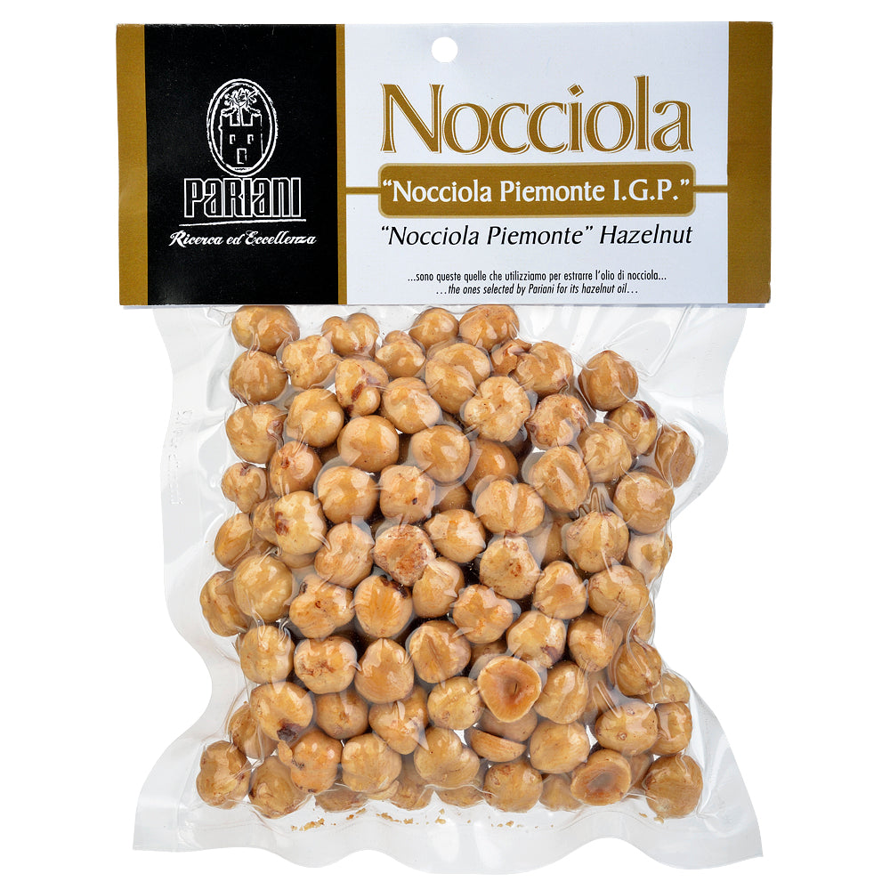Packaged hazelnuts with Pariani branding on a white background