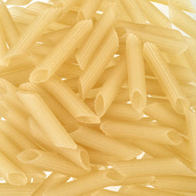 Close up of rice penne rigate pasta noodles