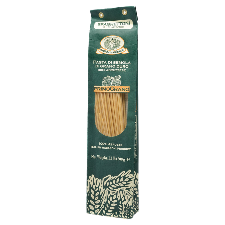 Spaghetti pasta package with green packaging and visible brand name on a white background