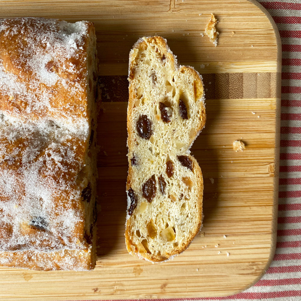 Stollen sliced on a cutting board