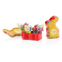 Open tin of Venchi Easter bunny gift in yellow