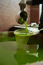 Extra Virgin Olive Oil Being Poured