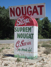 A road-side sign in French advertising Nougat from Suprem'Nougat G. Savin